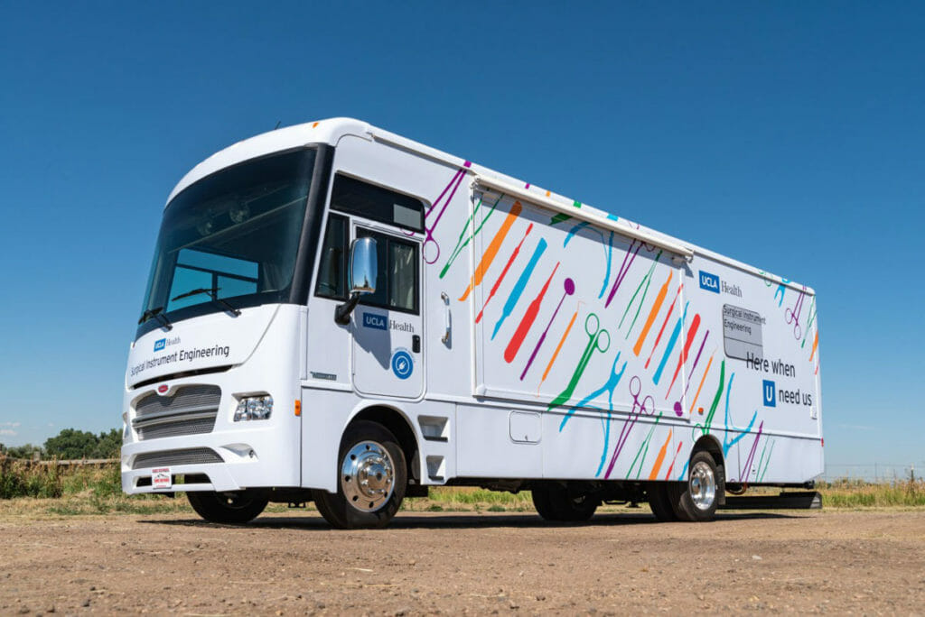 Side view of a large alternative fuel vehicle
