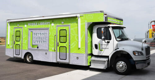 Exterior of bright green bookmobile for Detroit library